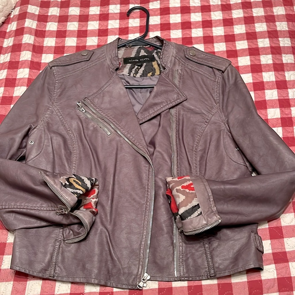 Grey faux leather jacket size medium looks and feels like soft leather, lined